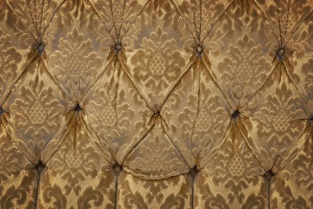 depositphotos_301505872-stock-photo-background-upholstery-worn-vintage-armchair-min