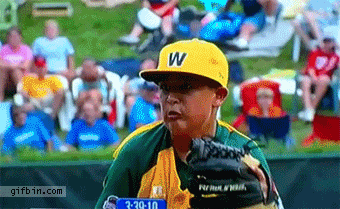 1314185455_kid_baseball_catcher_gets_hit_in_the_face