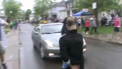 Girl jumps into car at Palmer Fest