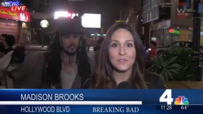 Captain Jack interrupts News Reporter