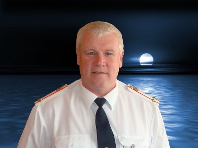 За туманами.