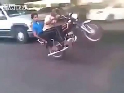 Two mofos on a motorcycle