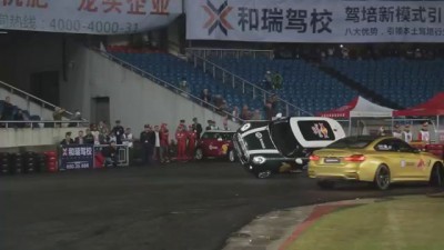 Most donuts (drift spins) around a car driving on two wheels in one minute - Guinness World Records