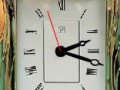 golden photo frame clock