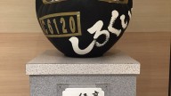 Black_Daruma_at_Takasaki_Station_Gunma_Prefecture_Japan