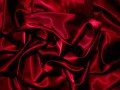 Texture of a red silk closeup