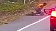 Leopard Knocks Over Cyclist in India