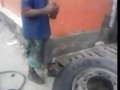 Man Inflates Tire with Fire and Pants Fall Down